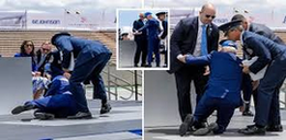 President Biden falls on stage at US Air Force Academy image