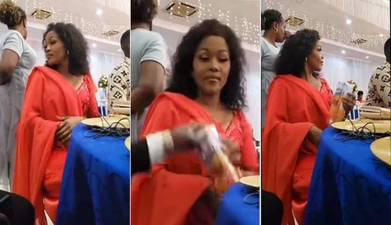 Man’s reaction trends as he catches wife hiding a pack of juice under a table during the wedding (Video) image